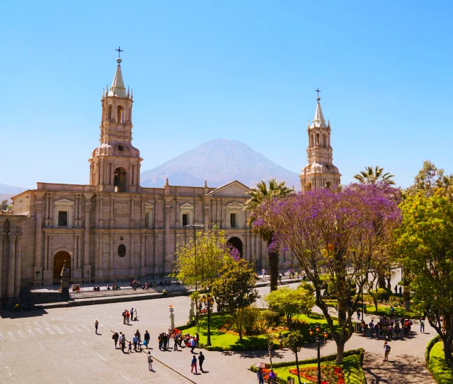 Arequipa Main Square with View of Misti Volcano | Conde Travel Adventures Panoramic view of Arequipa’s main square and cathedral with Misti volcano in the background in Peru | Conde Travel Adventures